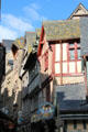 Shops & restaurants along narrow Grande Rue. Mont-St-Michel, France.