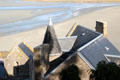 Looking down on varied roofs of Mont-St-Michel above tidal flats. Mont-St-Michel, France.
