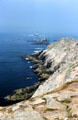 View along coast to island lighthouses. Pointe du Raz, France.