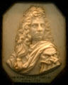 Portrait carving on bone of man with face on shoulder by Le Marchand at Dieppe Castle Museum. Dieppe, France.