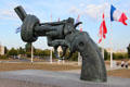 Non-Violence: Knotted Gun sculpture by Carl Fredrik Reuterward at Caen Memorial. Caen, France.