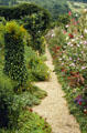 Path through flower garden created by Claude Monet at Giverny. Giverny, France