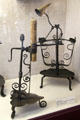 Adjustable height candle stands from France at Wrought Iron Museum. Rouen, France.
