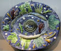 French glazed earth basin with creatures in style of Bernard Palissy at Rouen Ceramic Museum. Rouen, France.