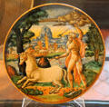 Earthenware plate with Neptune creating the horse from Urbino, Italy at Rouen Ceramic Museum. Rouen, France.
