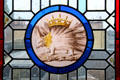 Stained glass panels with porcupine emblem of Louis XII in Estates General Room at Blois Chateau. Blois, France