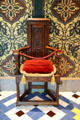 Walnut gossip chair from France in Queen's chamber at Blois Chateau. Blois, France.