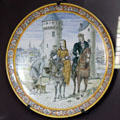 Louis XII & Anne of Brittany giving Alms painted on plate by Adrien Thibault of Blois faience at Blois Chateau. Blois, France.