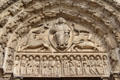 Central portal with Christ & symbols of 4 Evangelists over saints Chartres Cathedral. Chartres, France.