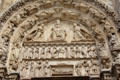 Arched doorway tympanum carved with symbols of Virgin Mary at Chartres Cathedral. Chartres, France.