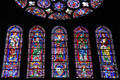 Virgin, four Evangelists & saints stained glass under south rose window at Chartres Cathedral. Chartres, France.