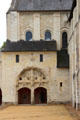 Romanesque side doorway at Fontevraud Abbey church. Fontevraud, France.