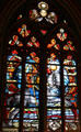 Stained glass window of Joan of Arc on horse by Pierre Carron in her chapel at Orleans Cathedral. France.