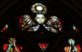 Facial detail on stained glass window of Joan of Arc on horse by Pierre Carron in her chapel at Orleans Cathedral. France.