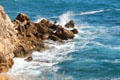 Mediterranean breaks on rocky shoreline. Antibes, France.