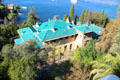 View of mansion on the sea from garden at Villa Ephrussi de Rothschild. Saint Jean Cap Ferrat, France.
