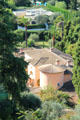 View of neighboring mansion from garden at Villa Ephrussi de Rothschild. Saint Jean Cap Ferrat, France.
