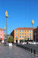 Set of statues on platforms, geometric pavement & arcaded building along Promenade du Paillon. Nice, France.