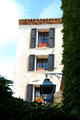 Multi-story residence framed by greenery. St Paul de Vence, France.