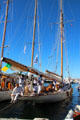 Crew of sailing yacht preparing for The Sails of St. Tropez regatta. St Tropez, France.