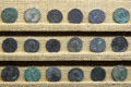 Roman coins produced by Lugdunum mint at Gallo Roman Museum. Lyon, France.