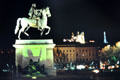 Night view of Louis XIV equestrian monument on Place Bellecoeur with Fourvière Hill in distance. Lyon, France.