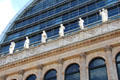 Facade detail of Opéra Nouvel theater opposite rear facade of Lyon City Hall. Lyon, France.