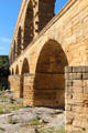 Angled buttresses designed to protect bridge from high water & ice at Pont du Gard. Nimes, France.