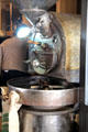 Coffee roasting machine at vegetable market. Aix-en-Provence, France.