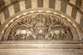 Relief of stags protecting lamb of god over entrance of Marseille Cathedral. Marseille, France.