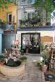 Courtyard of florist shop. Orange, France.