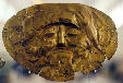 Gold burial mask from Mycenae at National Archeological Museum in Athens. Greece.