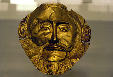 Burial mask made of gold from Mycenae at National Archeological Museum, Athens. Greece.