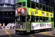 Heritage double deck tram rolls on street of Honk Kong. Hong Kong.