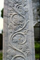 Recent shamrock carvings on a burial cross at Monasterboice. Ireland.