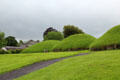 Neolithic satellite tombs at Knowth. Ireland.