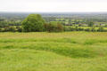 View from Hill of Tara with ancient trenches in foreground. Ireland.