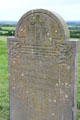 Christian monument slab with Celtic decoration & language at Hill of Tara. Ireland.