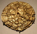 Gold disk perhaps from collar from Armagh at National Museum of Ireland Archaeology. Dublin, Ireland.