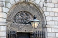 Carved entangled dragons over entrance of Kilmainham Gaol. Dublin, Ireland