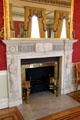 Carved fireplace with mirror in State Drawing Room at Dublin Castle. Dublin, Ireland.