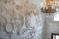 Details of sculpted stairwell walls & chandelier at Russborough House. Ireland.