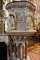 Pulpit ringed by Evangelist statues at St Patrick's Cathedral. Dublin, Ireland.