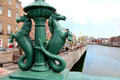 Double sea horse light standards on Grattan Bridge over River Liffey. Dublin, Ireland.