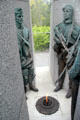 View into pyramid of National Memorial to Members of Defence Forces Who Have Died in Service shows soldiers over perpetual flame at Merrion Square. Dublin, Ireland.