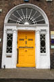 Yellow Georgian door on Merrion Square. Dublin, Ireland