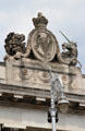 Sculpture of coat of arms with lion & unicorn flanking Irish harp atop Custom House, Dublin. Dublin, Ireland.