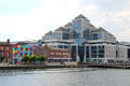 Converted warehouses & George's Quay Plaza on south bank of River Liffey. Dublin, Ireland.