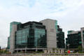 IFSC House office building at ship turning basin off River Liffey at Custom House Basin. Dublin, Ireland.
