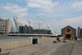 Samuel Beckett Bridge & Dublin Convention Center over River Liffey. Dublin, Ireland.